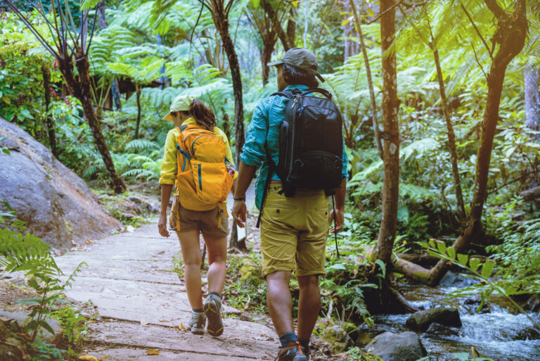 man and woman on a nature work.